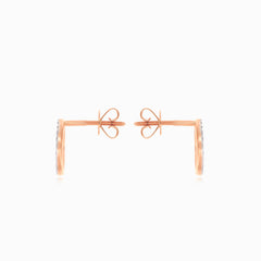 Rose gold stud earrings with round diamond