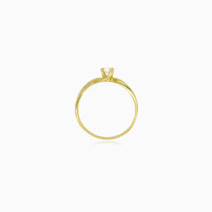 Yellow gold solitaire cubic zirconia ring