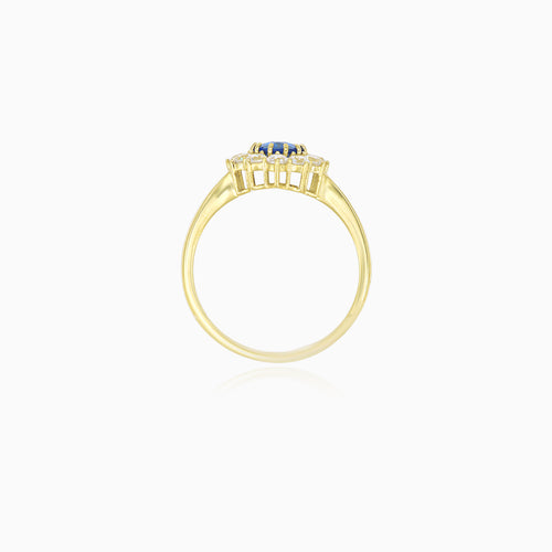 Bague en or jaune avec zircone cubique et saphir