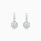 Boucles d’oreilles pendantes en opale blanche avec zircone