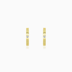 Boucles d’oreilles créoles en or jaune avec zirconium