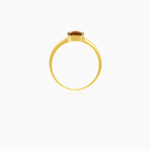 Princess cut solitaire garnet yellow gold ring