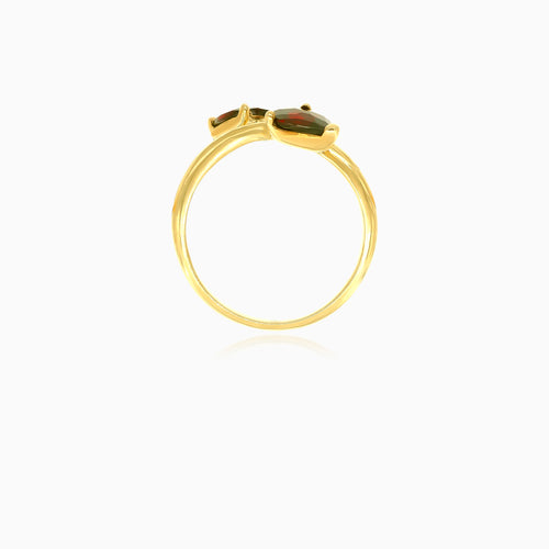 Leaf design ring with pear garnet