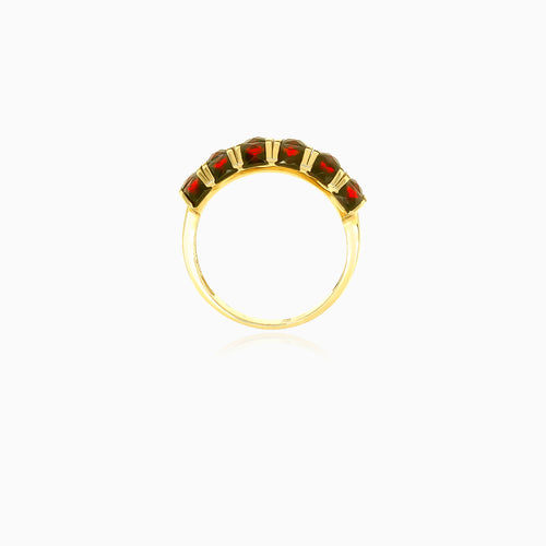 Stylish yellow gold ring with garnets
