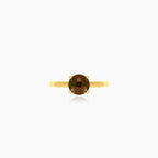 Yellow gold ring with one round garnet