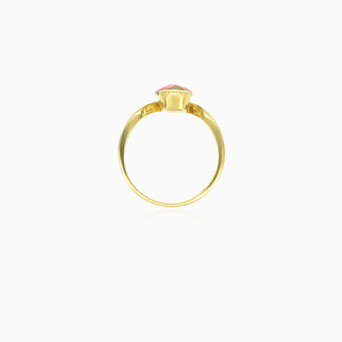 Bague simple en or jaune avec grenat taille poire
