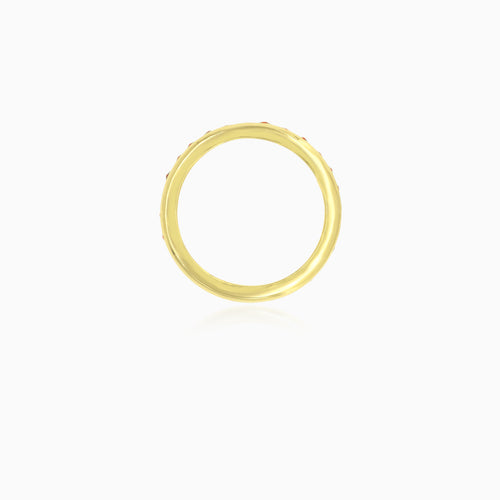 Yellow gold ring with eternity garnets in bezel set