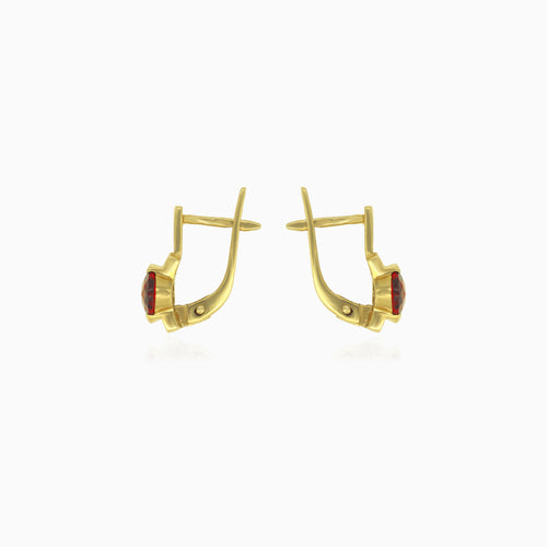 Solitärringe mit oval geschliffenem Granat als Tropfen-Ohrringe