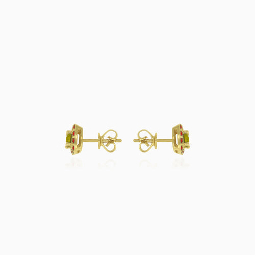 Eternal Radiance stud earrings in gold with moldavite and garnet