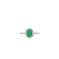 Sterling silver halo ring with oval emerald