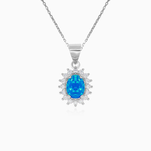 Sterling silver halo pendant with blue opal