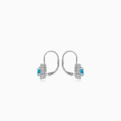 Halo sterling silver drop earrings with blue topaz