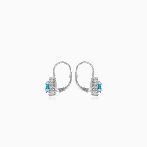 Halo sterling silver drop earrings with blue topaz