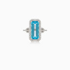 Elegant blue topaz baguette ring in white gold