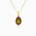 Pendentif Majestic Harmony en or jaune avec moldavite poire et grenat rond