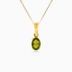 Přívěsek ze žlutého zlata s oválným vltavínem