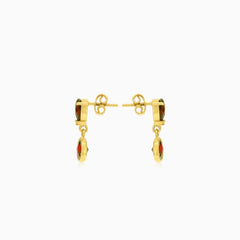 Boucles d'oreilles éclatantes avec grenat rond et poire