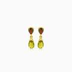 Boucles d’oreilles en or avec grenat et moldavite
