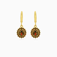 Regal 14kt gold garnet dangling earrings