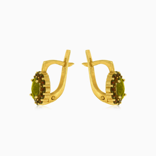 Boucles d’oreilles pendantes en or avec grenat et moldavite