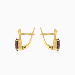 Boucles d’oreilles élégantes en grenat ovale en or 14 carats