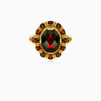 Bague artisanale en or avec barre sertie de grenat