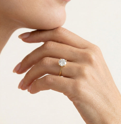 Bague en or à quatre griffes