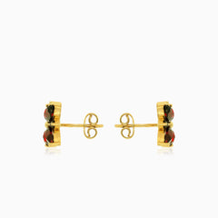 Zlaté náušnice ve tvaru markýzy s kulatými granáty