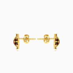 Pendientes elegantes de granate con diseño floral