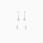 Boucles d’oreilles pendantes en argent avec perle