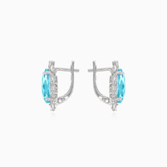 Silver topaz earrings with cubic zirconia around