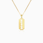 Přívěsek ze žlutého zlata s žiletkou