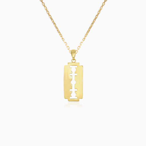 Přívěsek ze žlutého zlata s žiletkou