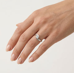 Twisted white solitaire ring