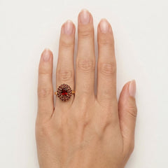 Oval and double round row garnet radiance ring