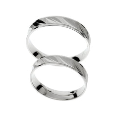 Snubní prsteny z bílého zlata se speciálním designem