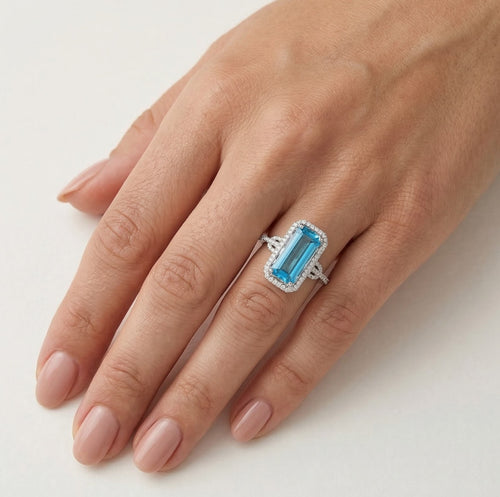 Elegant blue topaz baguette ring in white gold