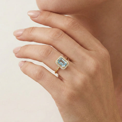 Zlatý prsten s modrým topazem, emerald brus