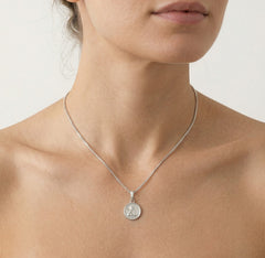 Pendentif ange en argent.
