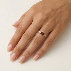 Garnet and cubic zirconia ring in yellow gold