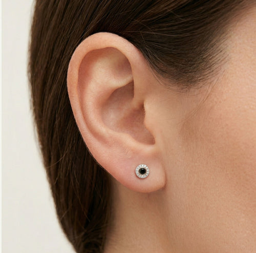 Stylish rose gold earrings with black and white diamonds