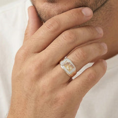 Lustrous ring with gun and cubic zirconia