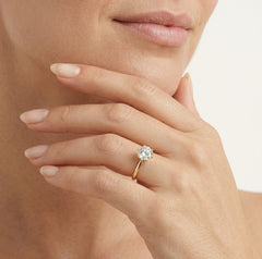 Yellow gold ring with round cubic zircon