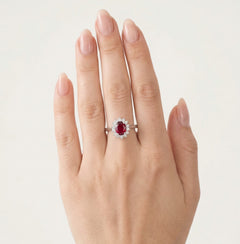 White gold ruby ring with halo of diamonds