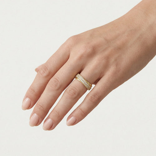 Gelbgoldring mit diagonal angeordneten Zirkoniasteinen