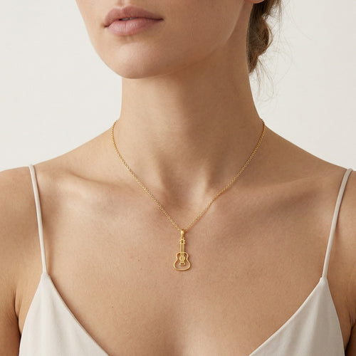 Anhänger in Gitarrenform aus Gelbgold