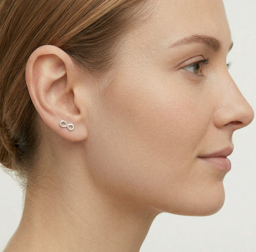 Boucles d’oreilles pendantes infini en or blanc