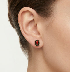 Pendientes de botón ovalados con granate en oro amarillo de 14 quilates
