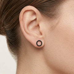 Yellow gold circle earrings with black onyx