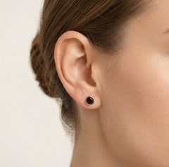 Round garnet stud earrings